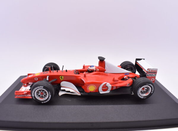 Modellino auto scala 1:43 FORMULA 1 F2002 barrichiello hotwheels diecast modellismo